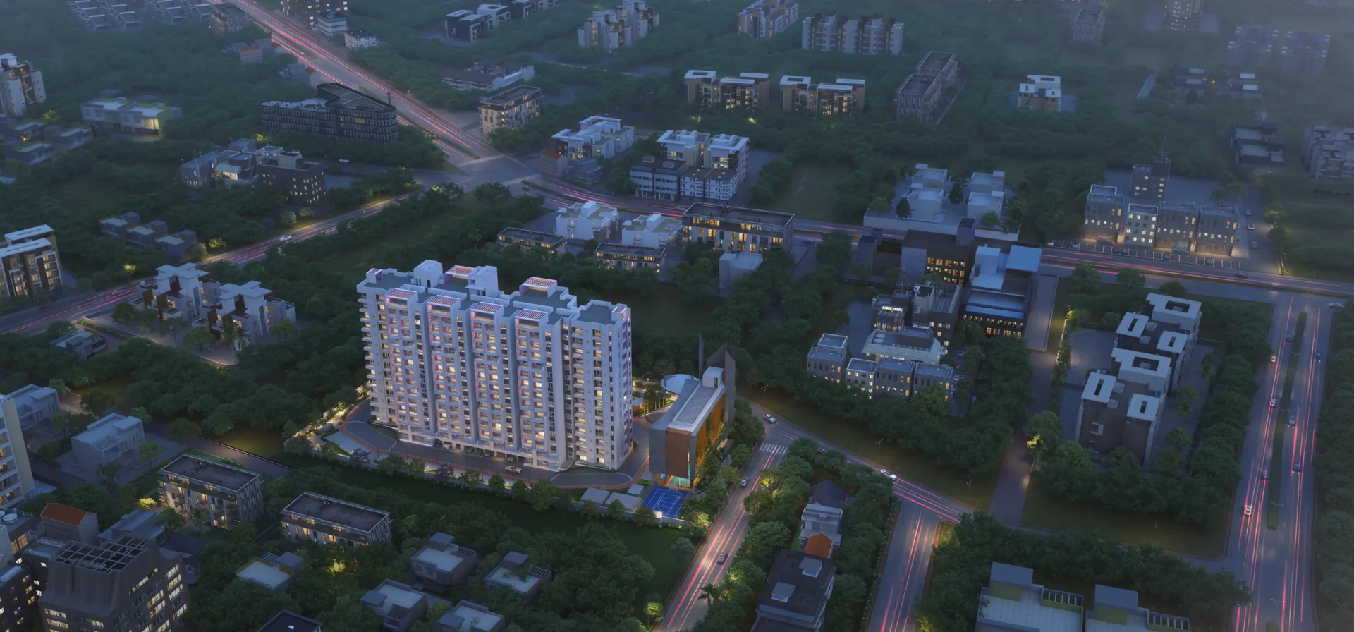 Dusk aerial of the lit tower set within its surrounding low-rise neighbourhood, with traffic light trails on the arterial roads