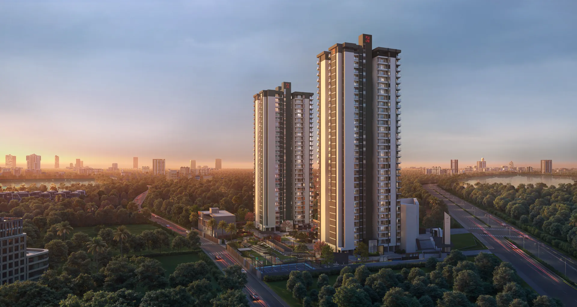 Dusk render of THE1's two residential towers rising above dense tree cover, landscaped grounds at their base and the city skyline on the horizon