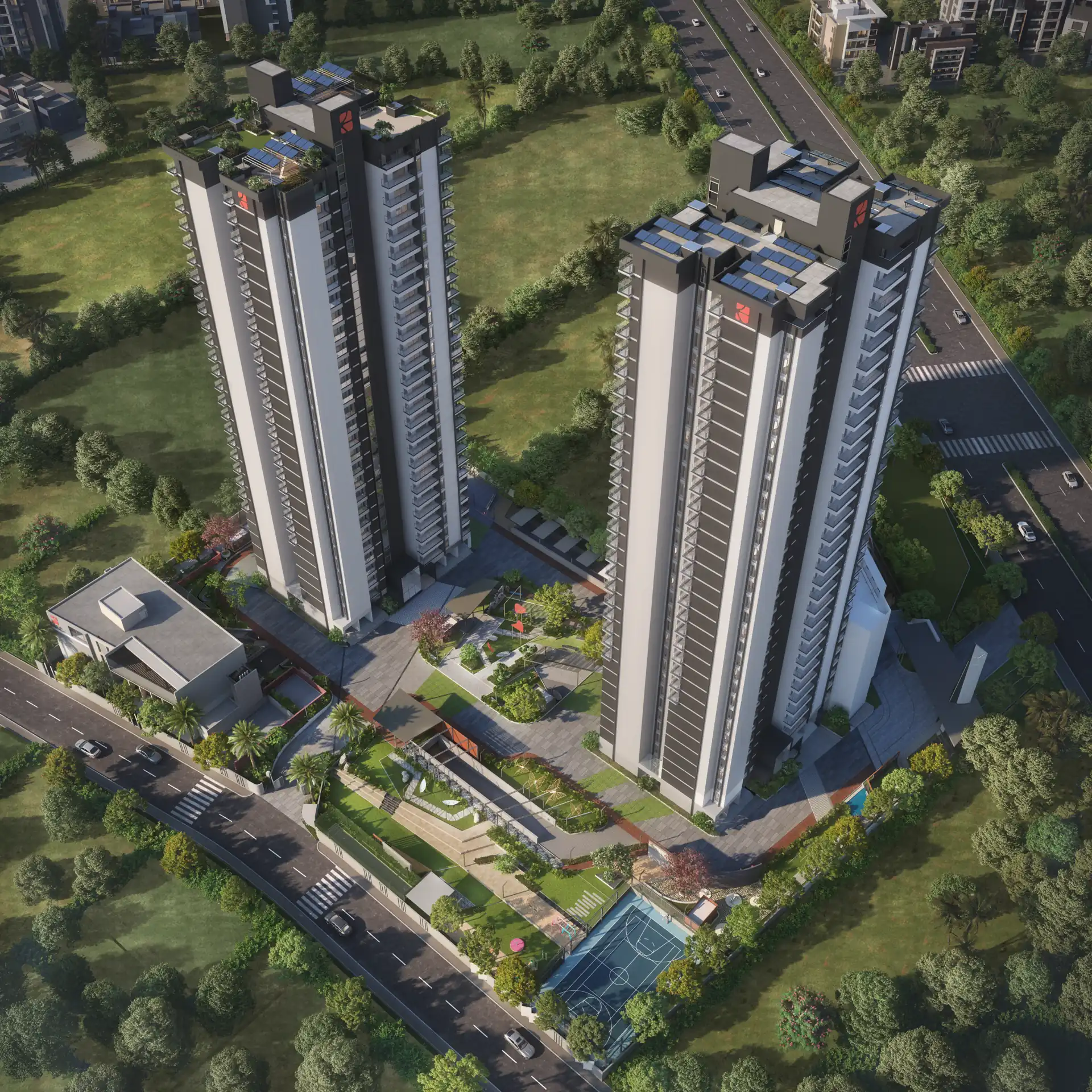 Aerial view of both towers showing the rooftop solar arrays, central courtyard and sports courts