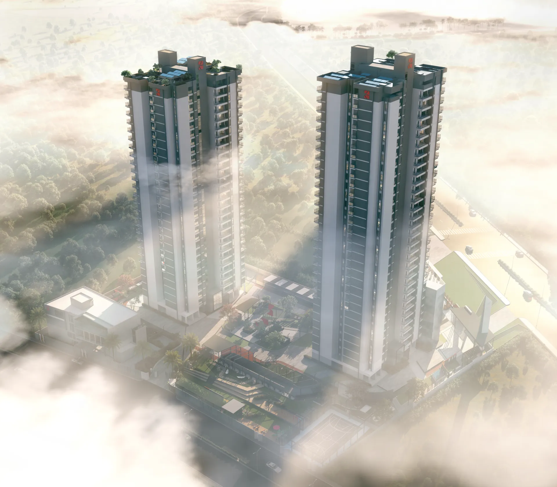 Aerial view of the two towers seen through low cloud, with the podium amenity deck below