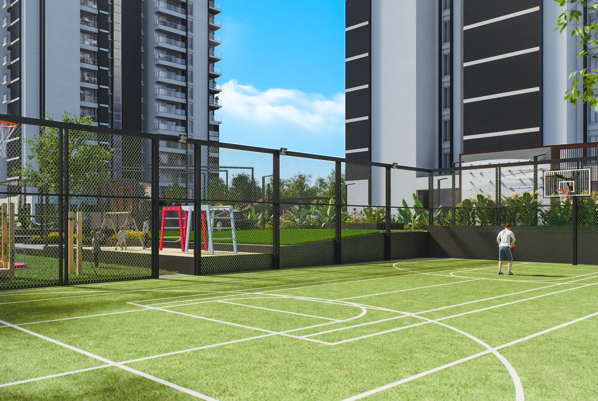 Fenced multipurpose sports court with a synthetic green playing surface and painted markings